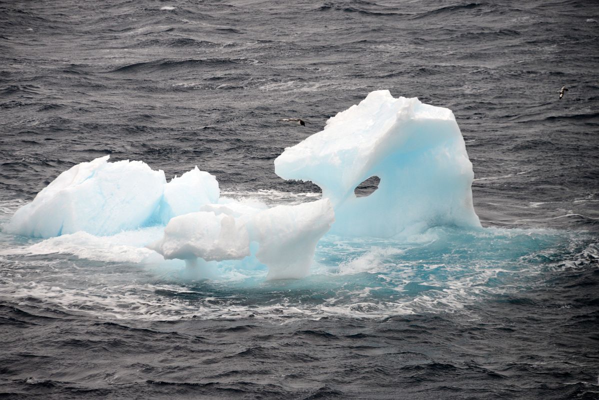 01C Iceberg With A Window Sailing Between Aitcho Barrientos Island And Deception Island On Quark Expeditions Antarctica Cruise Ship